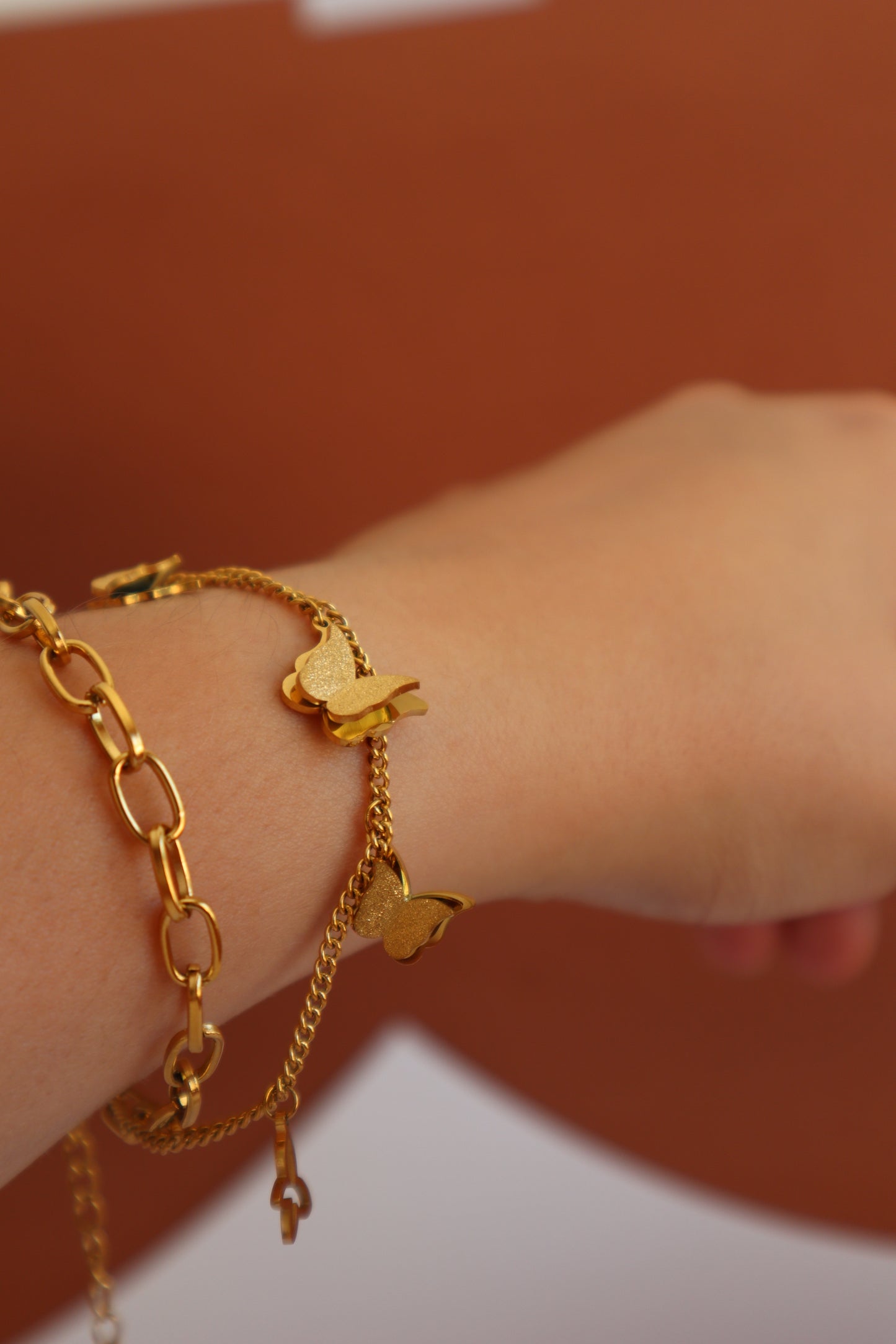 Pulseira com pendentes borboleta
