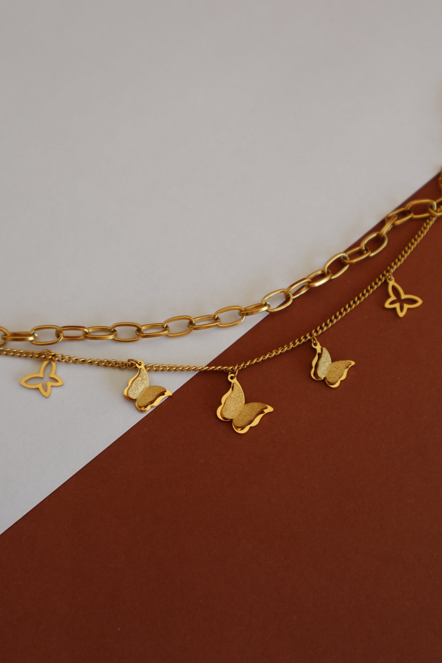 Pulseira com pendentes borboleta