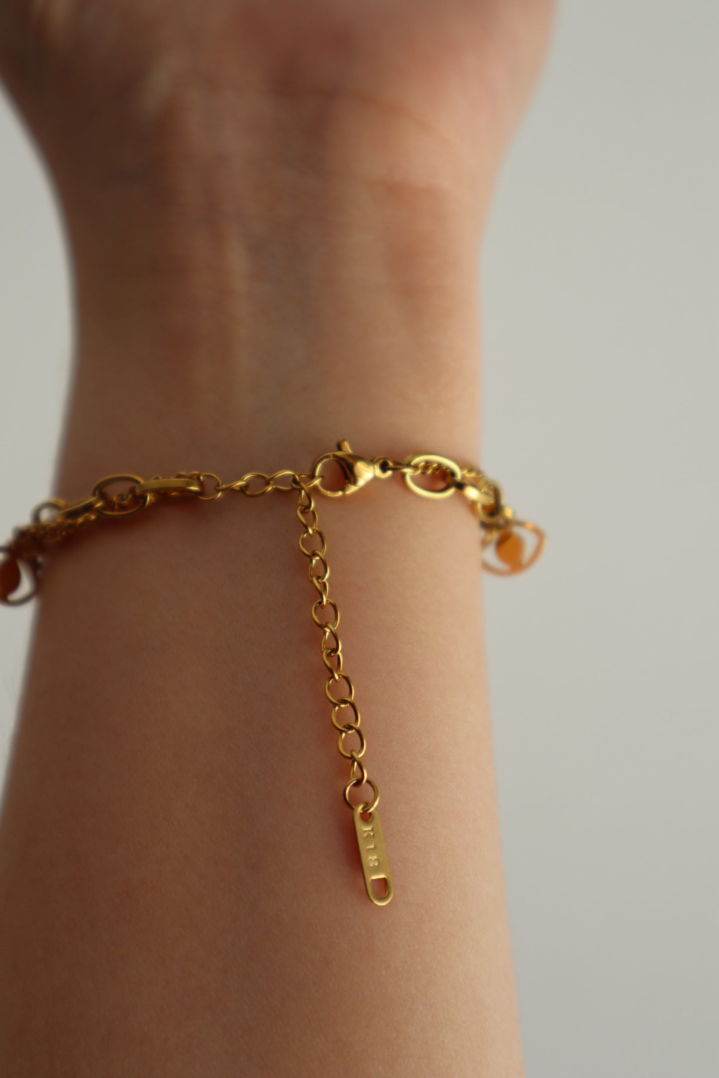 Pulseira dupla com cristais e olho