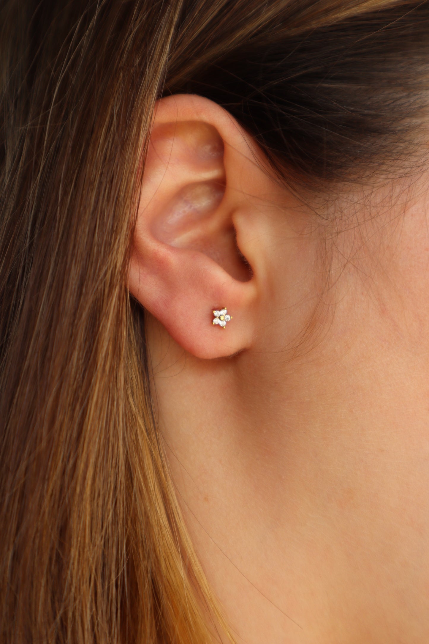 Piercing flor brilhante