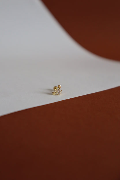 Piercing com várias estrelas